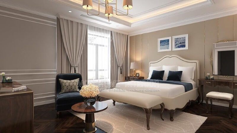 Giường ngủ tân cổ điển thanh lịch, quý phái với sắc trắng tinh khôi hòa quyện với đường nét mềm mại từ gỗ óc chó cao cấp tạo nên điểm nhấn ấn tượng cho phòng ngủ master.